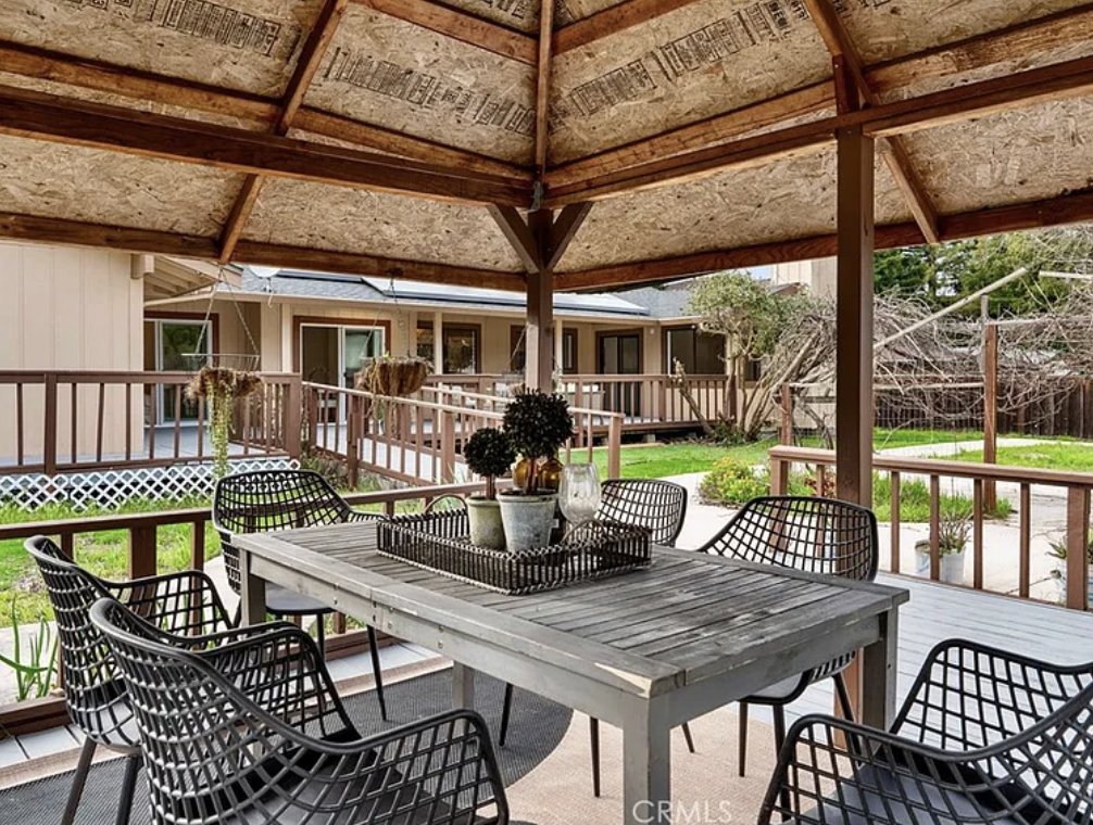 Covered gazebo and outdoor dining in the backyard at the Danville residence